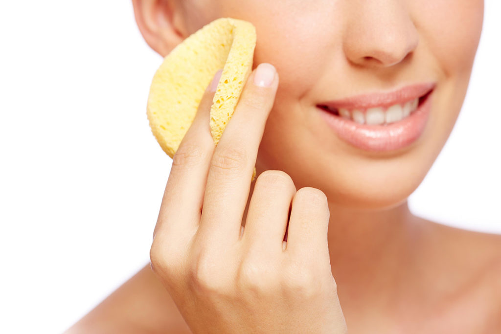 Close Up Woman Using Sponge Her Face 1 1024x683