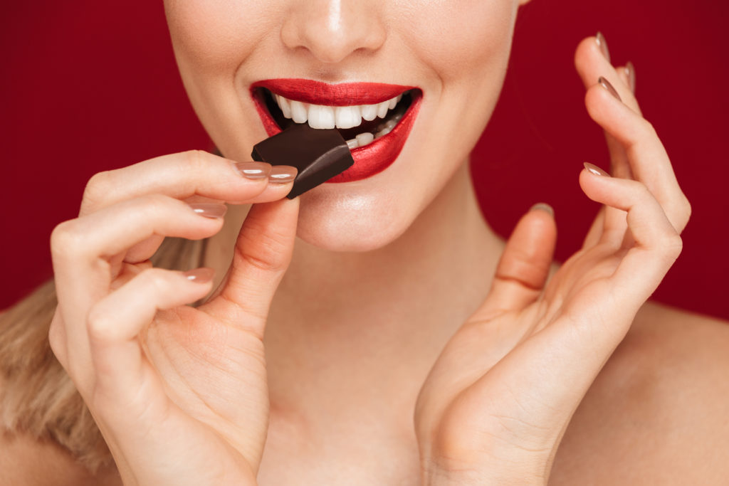 Canva Woman Eating Chocolate 1024x683
